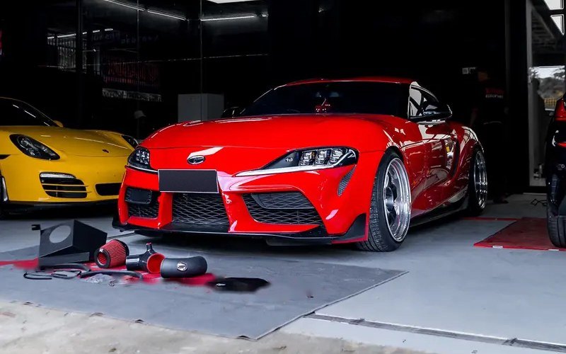 Red Toyota GR Supra MK5 with ZF Performance air intake